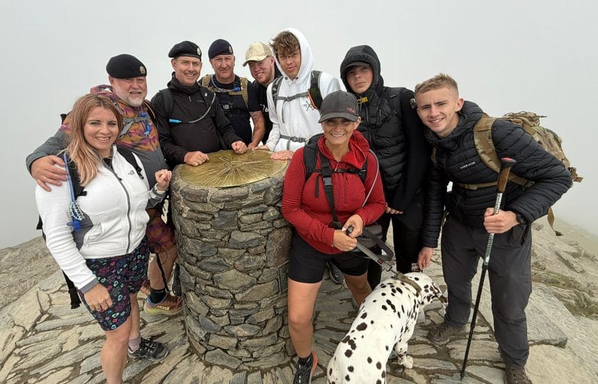Peter Coghlan rises to another challenge to share his inspirational journey with others 1 Peter Coghlan and friends at the top of Mt Snowdon 2025